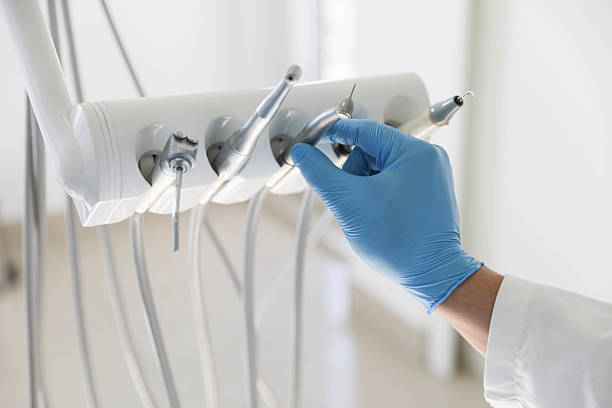 Professional Tooth Extraction technician working in Highland Park, IL